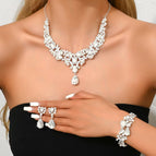 Silver necklace + earrings + bracelet
