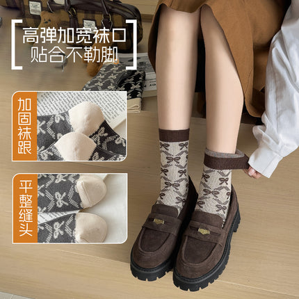 Zhuji socks women's autumn and winter retro trend women's socks bow printed socks warm cold-resistant pile socks wholesale