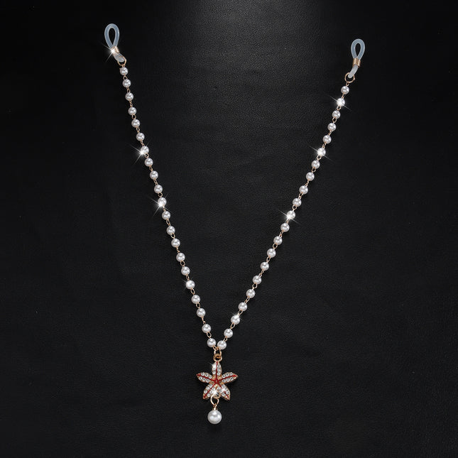 Cross-border hot selling simple pearl tassel double nipple chain flower pendant European and American nightclub disco body chain accessories for women