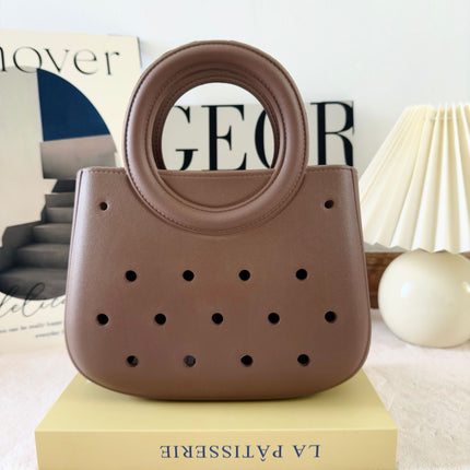 Cross-border new ladies handbag cartoon love fashion round travel storage bag eva hole bag beach bag