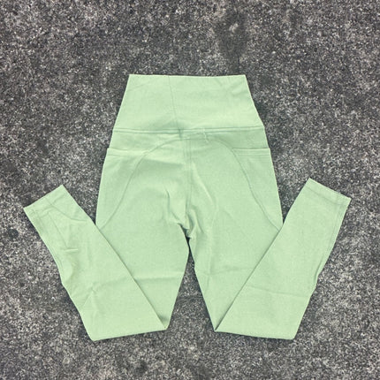Solid color high luxury brushed Lycra fitness leggings cross-border European and American high waist peach hip yoga pants side pocket women