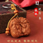 A pair of peach wood pixiu-keychain