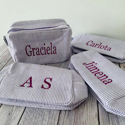 etsy hot selling seersucker embroidered striped cosmetic bag for travel portable toilet storage cosmetic bag