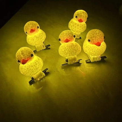 Selling cute magic luminous yellow duck hairpin super cute cartoon flash hairpin female headdress cross-border push night market