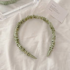 Green pleated headband