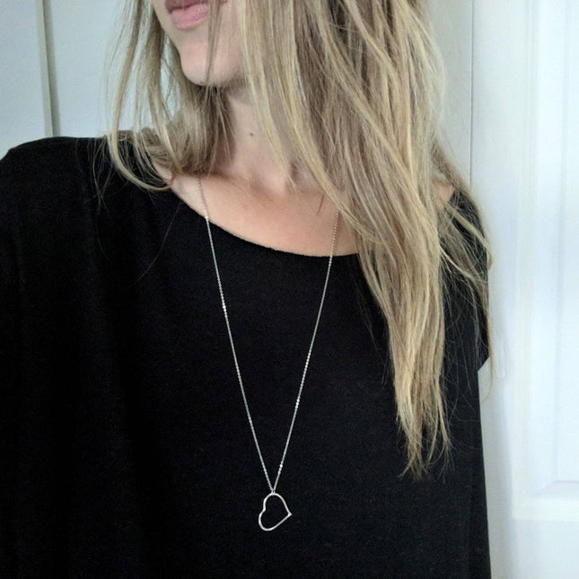 European and American foreign trade jewelry simple metal style sexy hollow love heart heart long sweater chain necklace necklace
