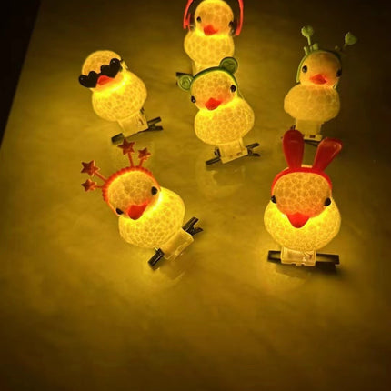 Selling cute magic luminous yellow duck hairpin super cute cartoon flash hairpin female headdress cross-border push night market