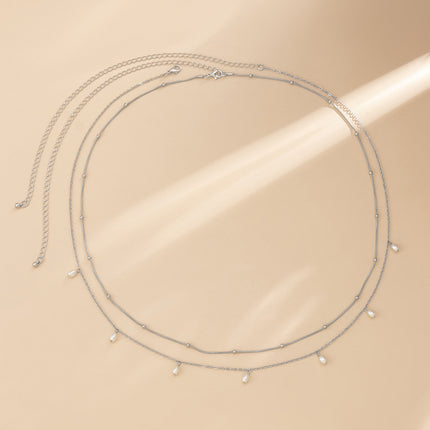 European and American Cross-Border Jewelry, Sweet and Cool Style Stacked Imitation Pearl Snake Bone Body Chain, Retro Tassel Ball Metal Waist Chain