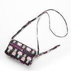 Black background cat + crossbody