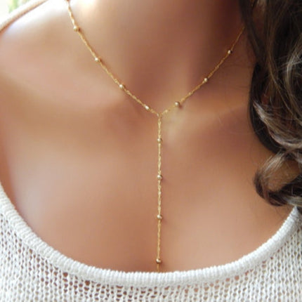 Europe and the United States cross-border hot-selling simple retro fashion women's short tassel clavicle chain gold-plated copper bead chain Y-shaped necklace