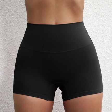 Summer solid color European and American women's high waist hip lifting peach sports shorts tight stretch fitness three pants can be worn outside