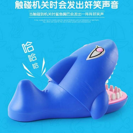 Shark toy press the teeth and mouth will move and bite the soft teeth big white shark trick the whole person new strange children's toy