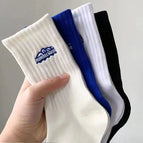 Light gray / mid-tube socks