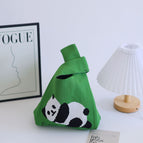 Lying bear green