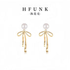 Gold bow earrings / S925 silver needle