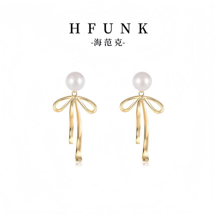 925 Silver Needle Korean and Japanese Summer Faux Pearl Bowknot Earrings Simple French Style Versatile 2026 New Women's Earrings