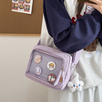 Purple pendant and badge