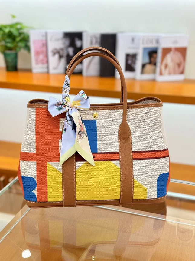 2025 New Canvas Top Layer Cowhide Women's Bag Garden Handbag Large Capacity Genuine Leather Contrast Shoulder Tote Bag