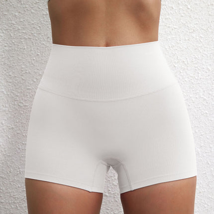 Summer solid color European and American women's high waist hip lifting peach sports shorts tight stretch fitness three pants can be worn outside