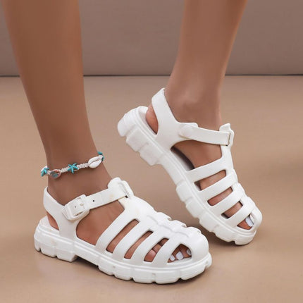 Thick-soled gear sandals women's shoes pig cage shoes covered toe hollow woven muffin Roman sandals plus size ins style sandals