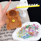 About 11cm high / Dark brown gold bell + a random color bead chain