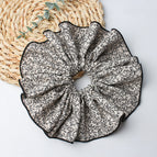 Floral large intestine hair tie-off-white with black edges