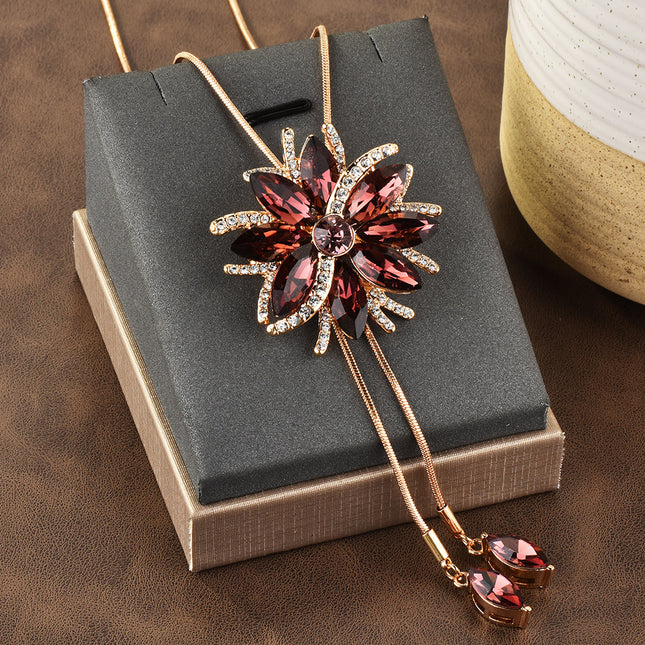 Factory direct supply autumn and winter long necklace female temperament all-match a two-wear flower tassel pull sweater chain brooch