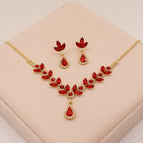 (necklace + earrings) bottom gold red