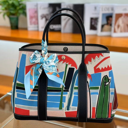 2025 New Canvas Top Layer Cowhide Women's Bag Garden Handbag Large Capacity Genuine Leather Contrast Shoulder Tote Bag