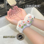 White wrist strap/2 small peaches