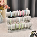 Three-layer gray bracelet stand