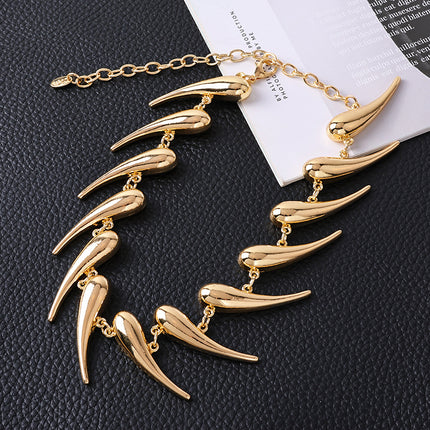 AliExpress cross-border European and American thorns stitching water drop pendant necklace exaggerated smooth comma pepper-shaped alloy necklace
