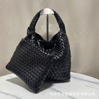 Black + woven bag + leather shoulder strap
