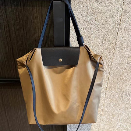 2025 New Waterproof Cloth with Head Layer Cowhide Bucket Bag Large Capacity Portable Shoulder Bag Commuter Crossbody Computer Bag