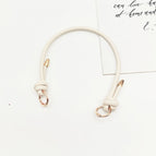 Off-white gold buckle
