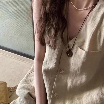 2025 Niche Summer New V Neck Pure Color Button Sleeveless Loose Casual Jumpsuit Shorts Women's Thin Trendy Ins Shorts