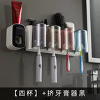 4 cups black and white toothpaste squeezer
