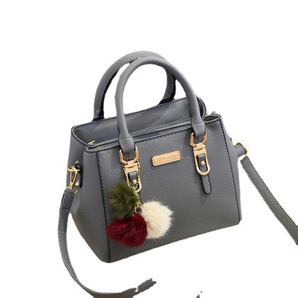 Small square bag ladies handbag simple shoulder bag large capacity bag double fur ball messenger bag wholesale cross-border