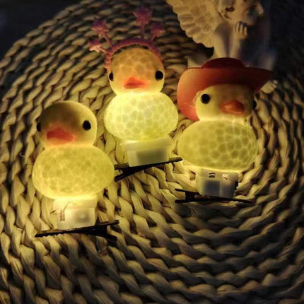 Selling cute magic luminous yellow duck hairpin super cute cartoon flash hairpin female headdress cross-border push night market