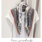 Brilliant cashew navy blue silk square scarf