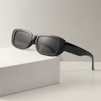 Bright black frame gray film