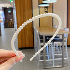 Single pearl headband