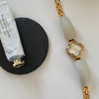 White with gold frame and white surface