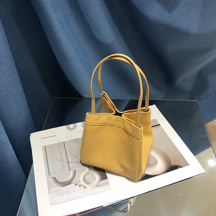 Factory wholesale New Korean version of leather small square bag Joker sheepskin bucket bag niche fashion underarm portable women's bag
