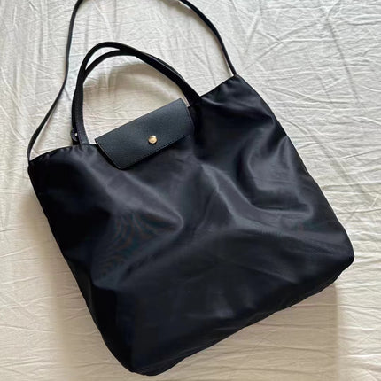 2025 New Waterproof Cloth with Head Layer Cowhide Bucket Bag Large Capacity Portable Shoulder Bag Commuter Crossbody Computer Bag