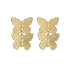 1 pair of golden stud earrings