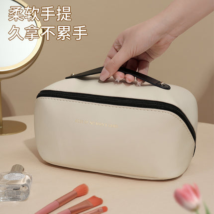 Factory Direct Sales Large-Capacity Storage Bag Pu Leather Satchel Travel Business Trip Portable 2024 New Pillow Cosmetic Bag