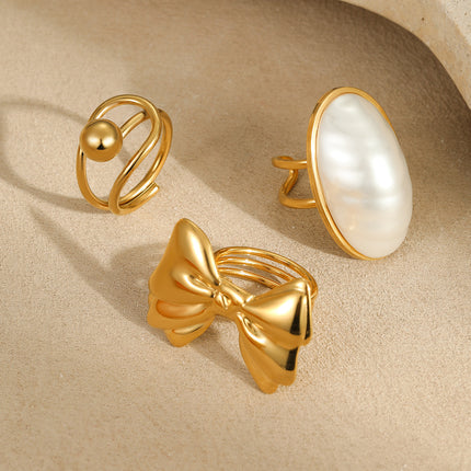 European and American Cross-Border Ins Niche Oval Egg-Shaped Pearl Ring Titanium Steel Ring Design Bow Open Ring