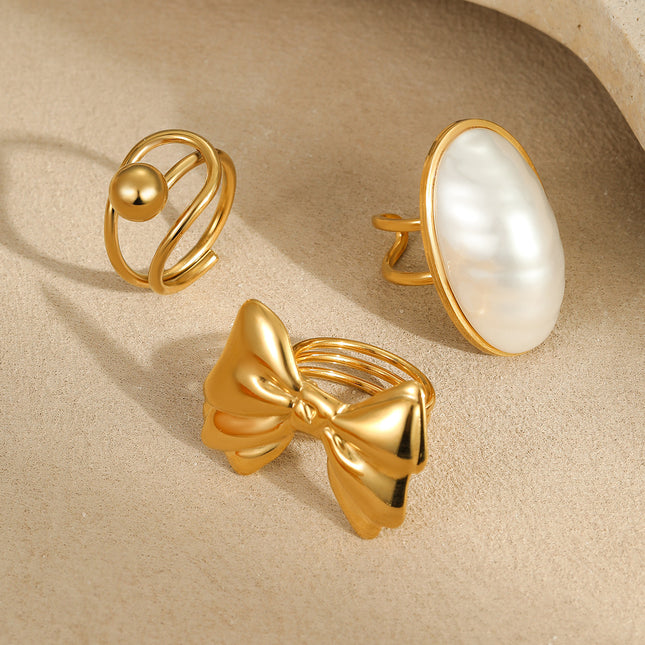 European and American Cross-Border Ins Niche Oval Egg-Shaped Pearl Ring Titanium Steel Ring Design Bow Open Ring
