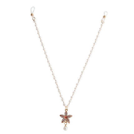 Cross-border hot selling simple pearl tassel double nipple chain flower pendant European and American nightclub disco body chain accessories for women